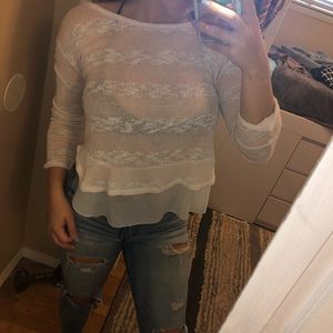 Pink and white sweater with lace underlay